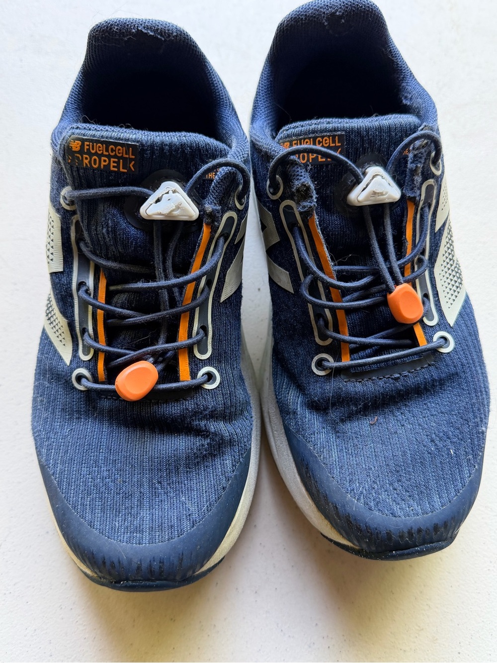 New Balance Navy and Orange Kids Athletic Sneakers